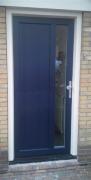 Deeur met deels paneel en deels glas